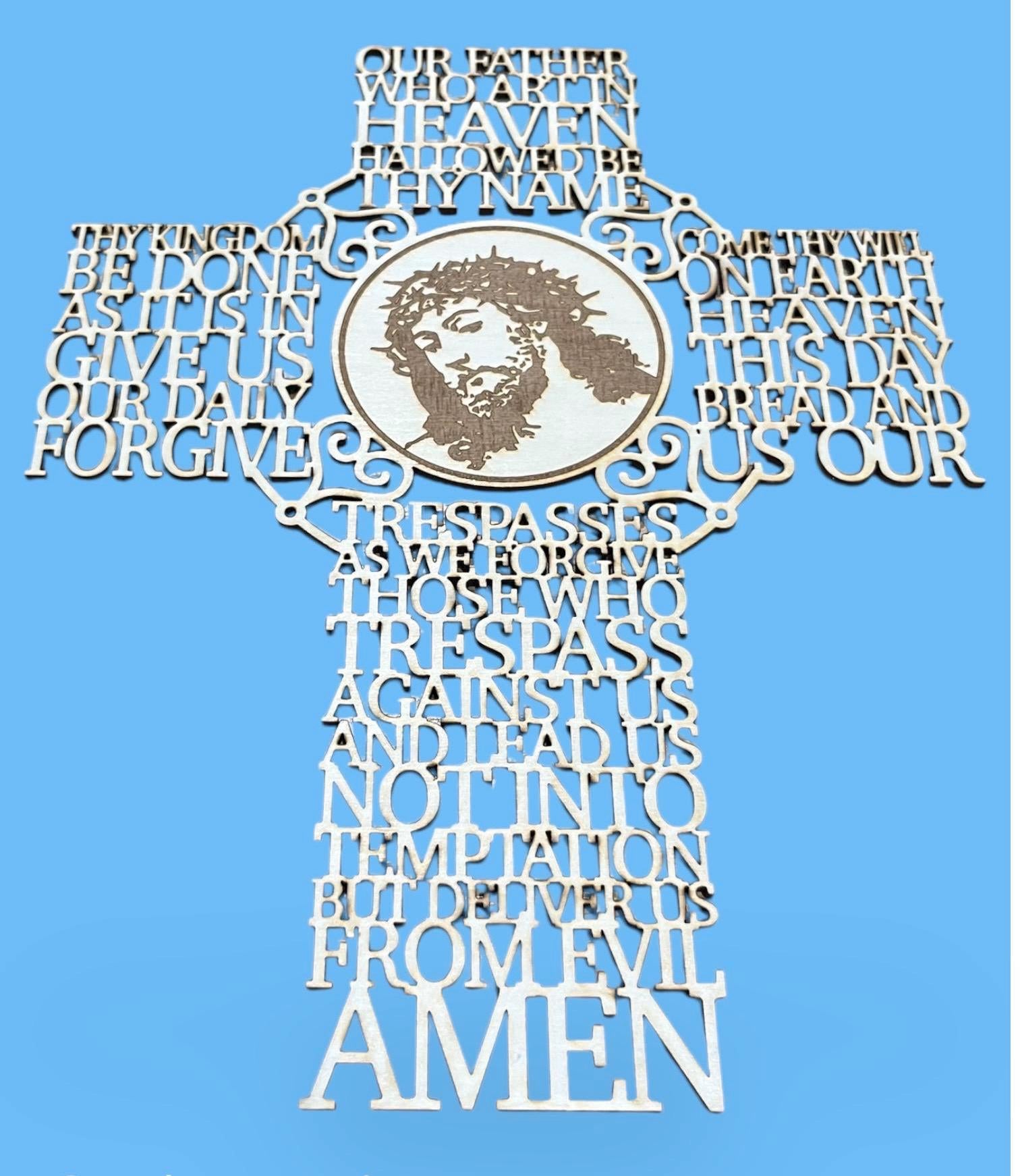Lord Prayer with Jesus cut in the shape of the cross.