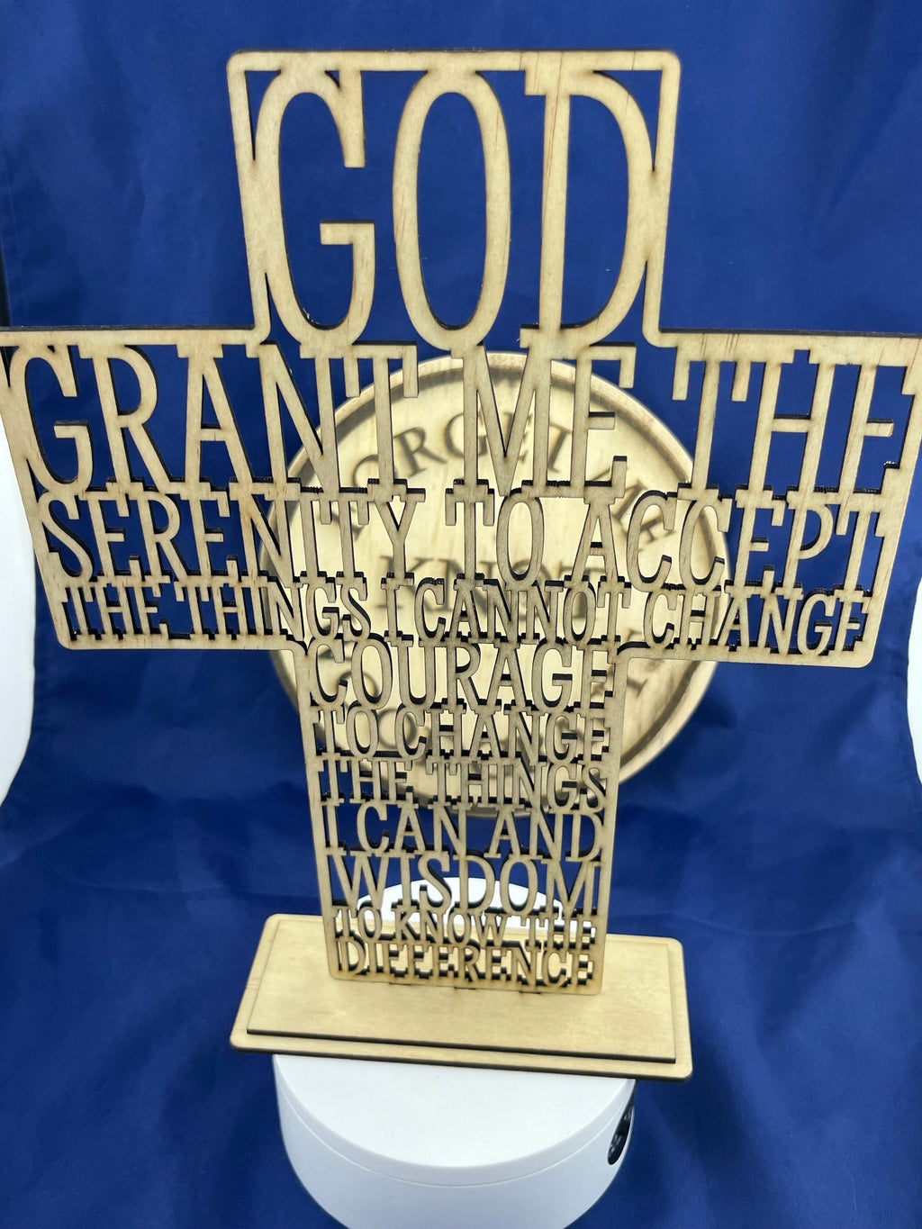 Serenity prayer laser cut into the sign of the cross